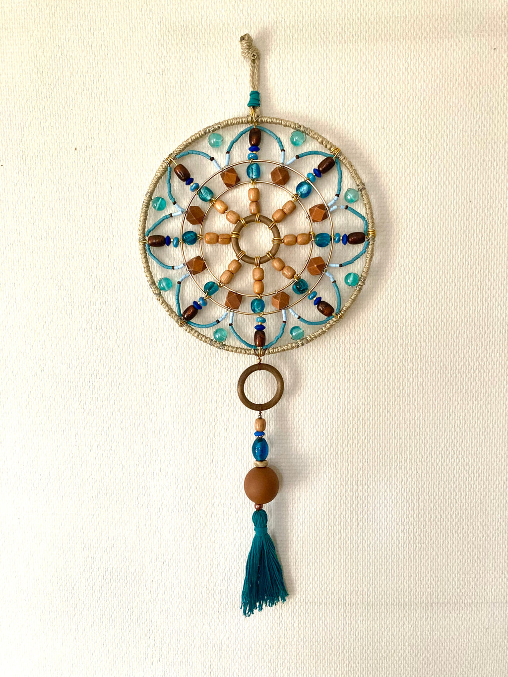 Handmade blue and wood mandala wall decoration