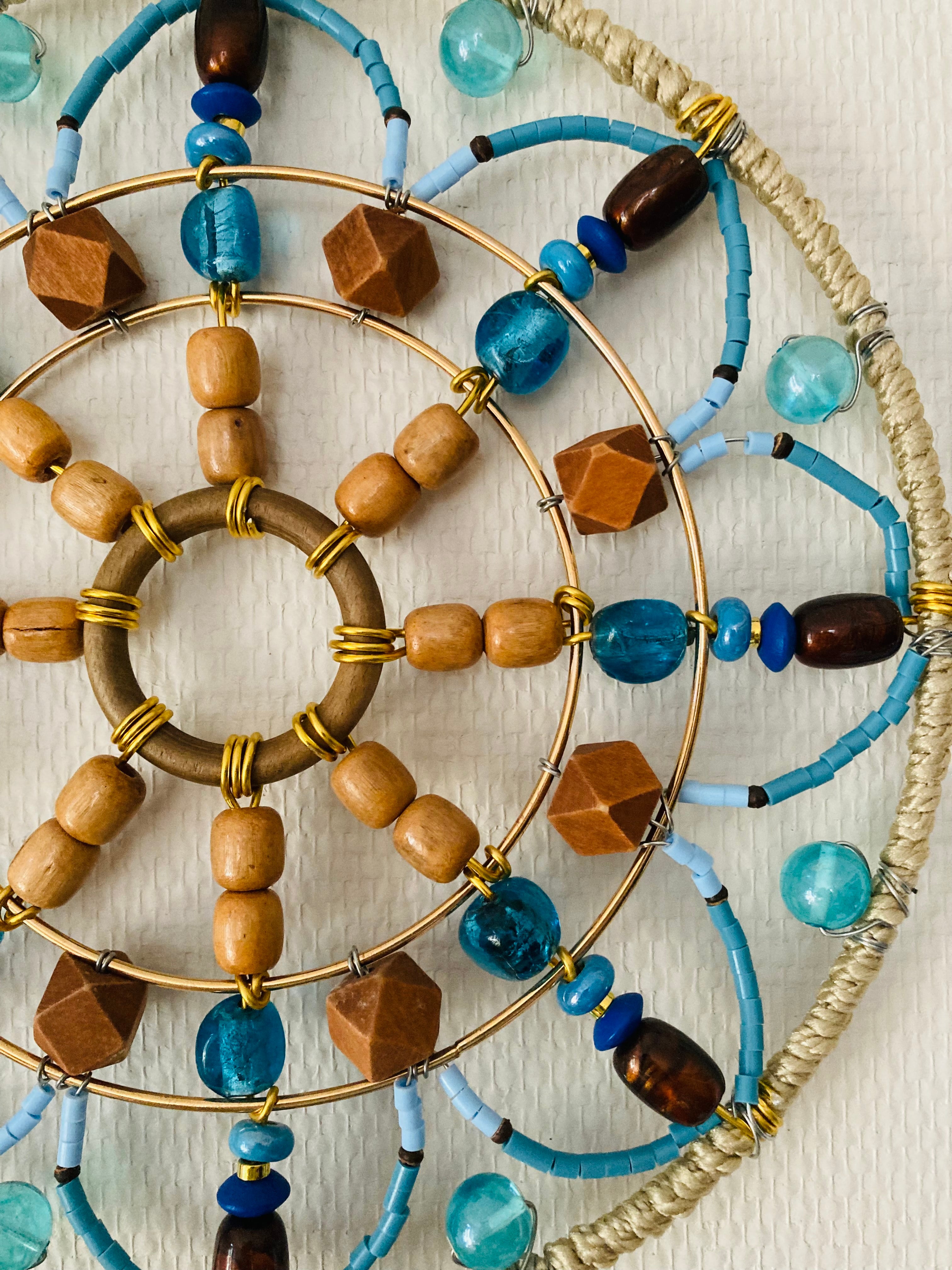 Handmade blue and wood mandala wall decoration